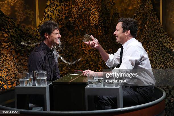 Episode 753 -- Pictured: Tom Cruise during a skit with host Jimmy Fallon on December 18, 2012 --