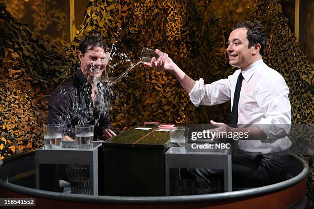 Episode 753 -- Pictured: Tom Cruise during a skit with host Jimmy Fallon on December 18, 2012 --