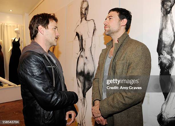 Stephen Moyer and Adam Rayner attend Lorien Haynes' Art Show at The Quest on December 14, 2012 in Los Angeles, California.