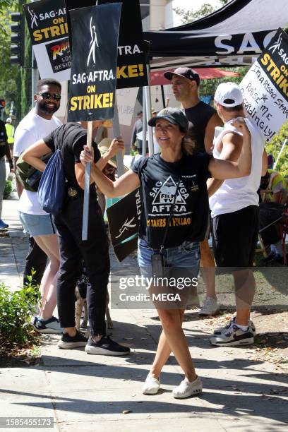 Cheri Oteri is seen picketing with SAG-AFTRA and WGA members outside of Warner Brothers studios on August 8, 2023 in Burbank, California.