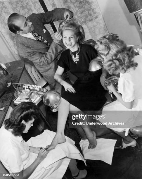 Young woman has a complete beauty treatment including feet, hands, and hair at the Helena Rubenstein beauty salon, New York, New York, Septembe 3,...