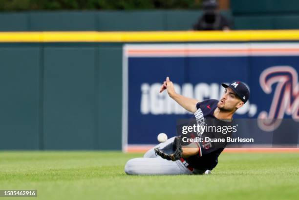 Right fielder Matt Wallner of the Minnesota Twins makes a sliding catch of a fly ball hit by Miguel Cabrera of the Detroit Tigers during the fifth...