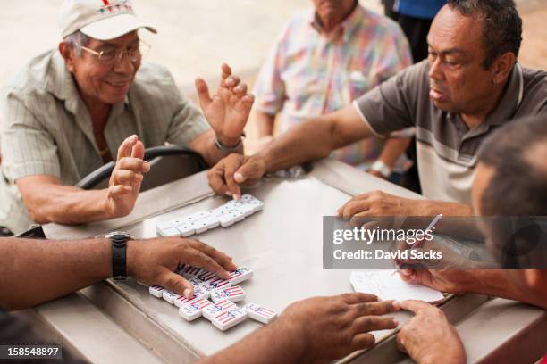 men take scores in dominos - old san juan fotografías e imágenes de stock