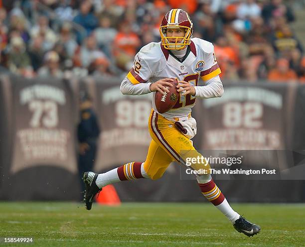 Washington quarterback Kirk Cousins rolls out to pass during the Washington Redskins defeat of the Cleveland Browns 38 - 21 at Cleveland Browns...