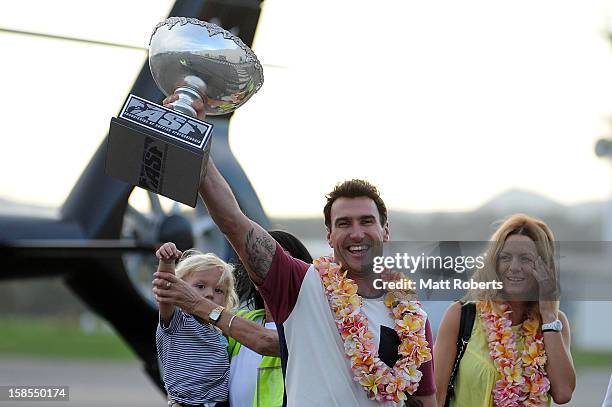 Australian surfer Joel Parkinson arrives home at the Gold Coast airport with wife Monica and son Mahli on December 19, 2012 on the Gold Coast,...
