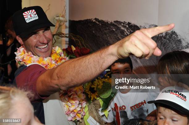 Australian surfer Joel Parkinson arrives home at the Gold Coast airport on December 19, 2012 on the Gold Coast, Australia. Parkinson won the Pipeline...