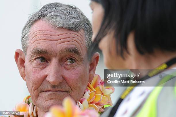 Bryan Parkinson looks to his wife, Geraldine as Joel Parkinson arrives home at the Gold Coast airport on December 19, 2012 on the Gold Coast,...