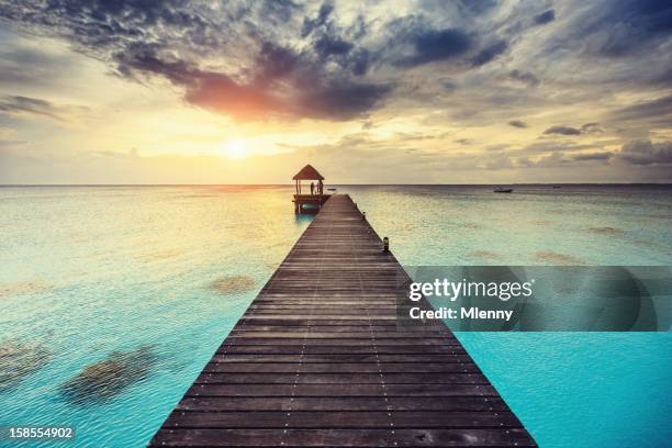 fakarava sunset at jetty french polynesia - tuamotu islands stock pictures, royalty-free photos & images