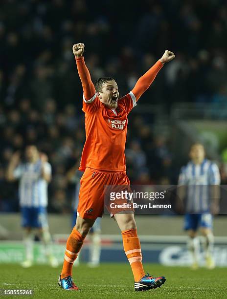 Shane Lowry of Millwall celebrates after after Chris Wood scored a second goal during the npower Championship match between Brighton and Hove Albion...