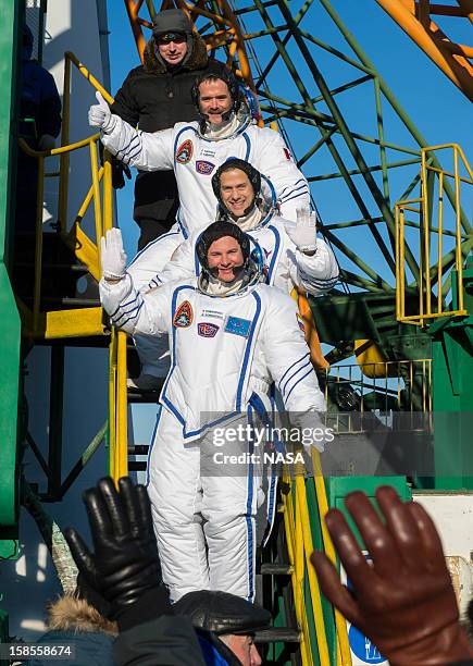 In this handout image provided by NASA, Expedition 34 NASA Flight Engineer Chris Hadfield of the Canadian Space Agency , NASA Flight Engineer Tom...