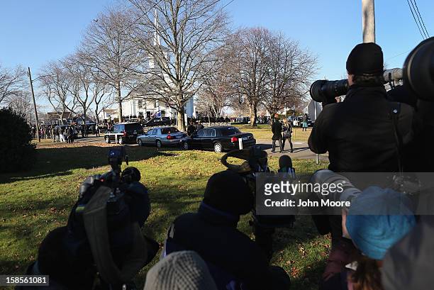 Media watch as people arrive for funeral services for slain teacher Victoria Soto at the Lordship Community Church on December 19, 2012 in Stratford,...
