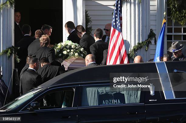Casket carrying the body of slain teacher Victoria Soto arrives to the Lordship Community Church on December 19, 2012 in Stratford, Connecticut. The...