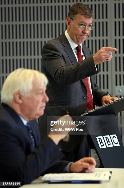 Nick Pollard, author of the Pollard Report, speaks as BBC Trust Chairman Lord Patten looks on during a press conference at BBC Broadcasting House on...