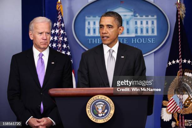 President Barack Obama announces the creation of an interagency task force for guns as as Vice President Joseph Biden listens in the Brady Press...