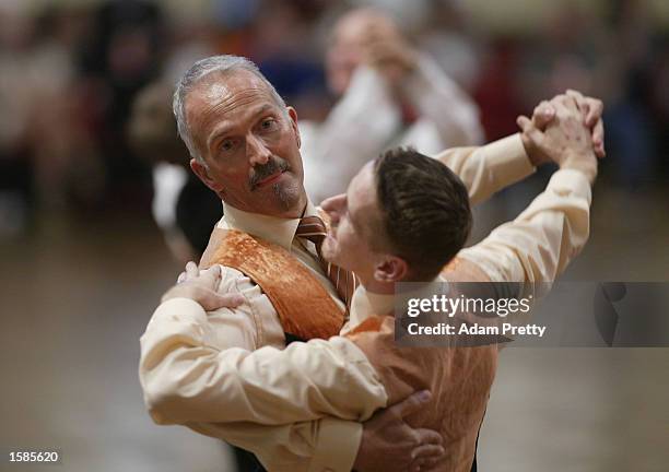 Burkhardt and partner Vitus Schmitz of Germany in action during the Mens graded Modern Dancing competition at the Sydney 2002 Gay Games, held in the...