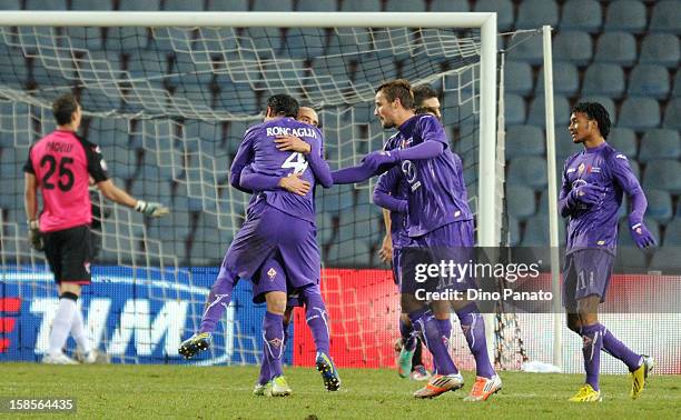 Borja Valero of AFC Fiorentina celebrate after scoring his opening second goal with their team- mate during the TIM Cup match between Udinese Calcio...