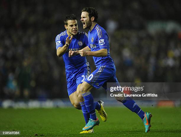 Juan Mata of Chelsea celebrates scoring his team's first goal to make the score 1-1 with team-mate Cesar Azpilicueta during the Capital One Cup...