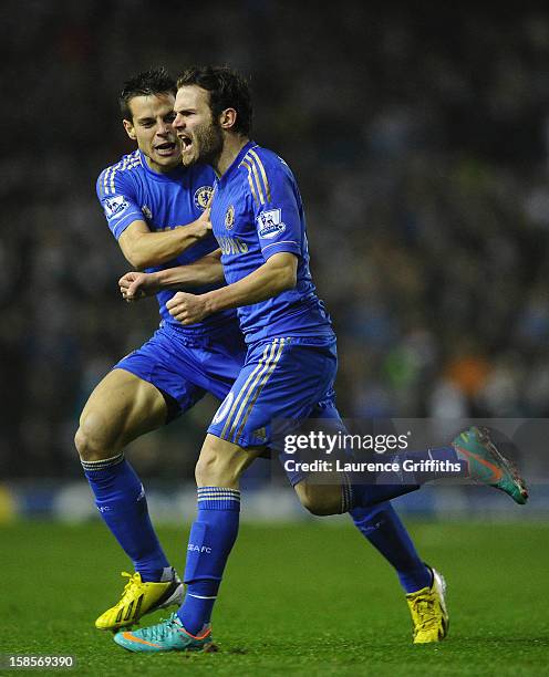 Juan Mata of Chelsea celebrates scoring his team's first goal to make the score 1-1 with team-mate Cesar Azpilicueta during the Capital One Cup...