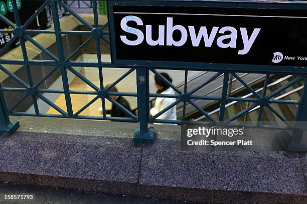 People enter the subway at Union Square on December 19, 2012 in New York City. Following the recommendation of outgoing Chairman Joseph Lhota, the...