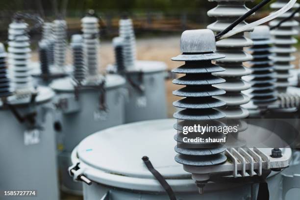 pole-mounted transformers - transformer stock pictures, royalty-free photos & images