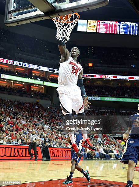 Montrezl Harrell of the Louisville Cardinals dunks the ball during the game against the Florida International Panthers in the Billy Minardi Classic...