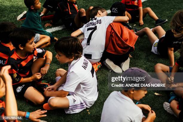 Young players attend a training session of the Direito's Summer Academy 2023 in Lisbon, on July 11, 2023.Grupo Desportivo Direito was founded in 1952...