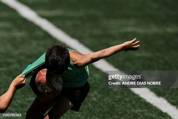 Young players in action during a training session of the Direito's Summer Academy 2023 in Lisbon, on July 11, 2023.Grupo Desportivo Direito was...