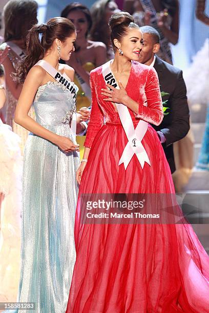 Miss Philippines 2012 Janine Tugonon and Miss USA 2012 Olivia Culpo and react during the 2012 Miss Universe Pageant at Planet Hollywood Resort &...
