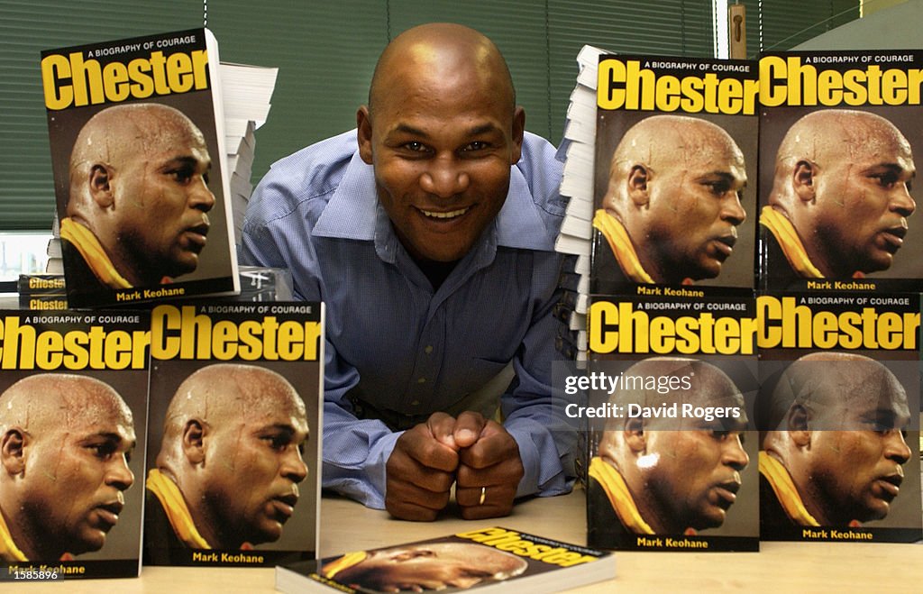 Chester Williams, the former Springbok wing, with copies of his biography