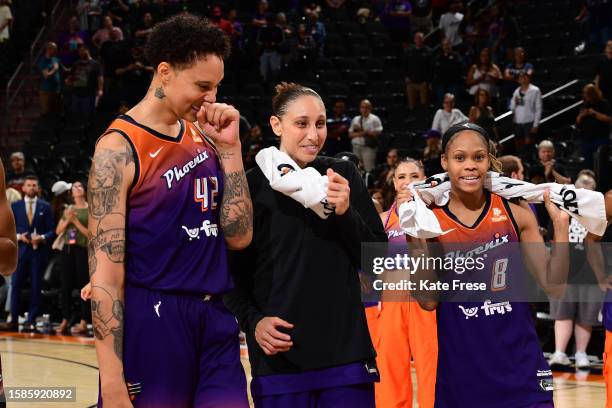 Brittney Griner, Diana Taurasi, and Moriah Jefferson of the Phoenix Mercury smiles after the game against the Washington Mystics on August 8, 2023 at...
