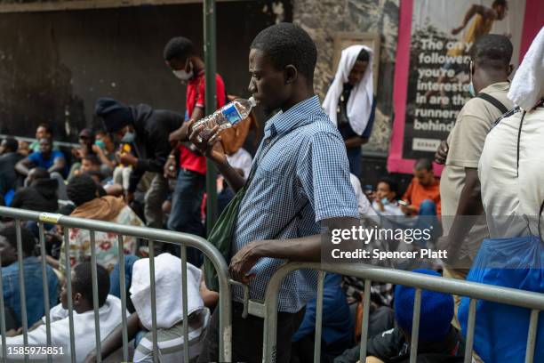 Dozens of recently arrived migrants to New York City camp outside of the Roosevelt Hotel, which has been made into a reception center, as they try to...