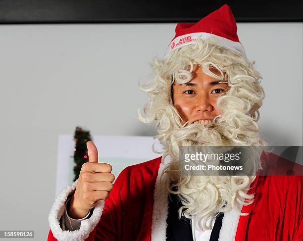 Eiji Kawashima, goal keeper of Standard de Liege poses in santa costume on December 11, 2012 in Liege,Belgium.