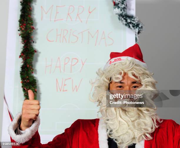 Eiji Kawashima, goal keeper of Standard de Liege poses in santa costume on December 11, 2012 in Liege,Belgium.