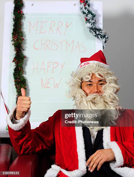 Eiji Kawashima, goal keeper of Standard de Liege poses in santa costume on December 11, 2012 in Liege,Belgium.