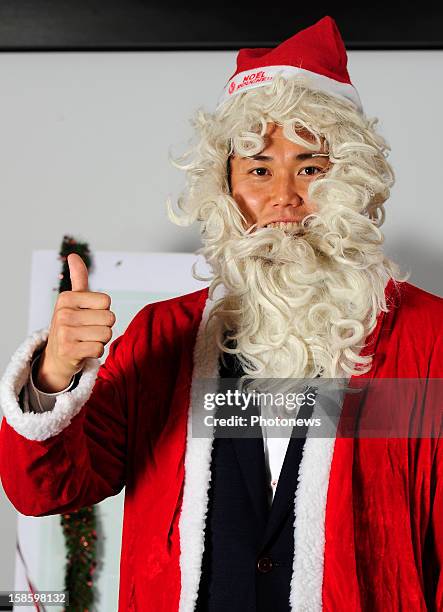 Eiji Kawashima, goal keeper of Standard de Liege poses in santa costume on December 11, 2012 in Liege,Belgium.