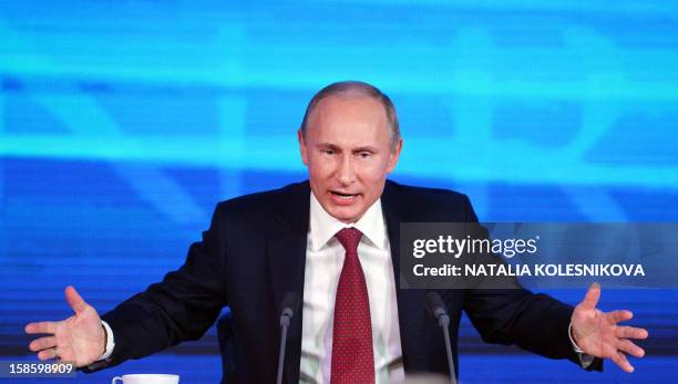 Russia's President Vladimir Putin holds the first major press conference of his third term in power in Moscow, on December 20, 2012. Putin denied...