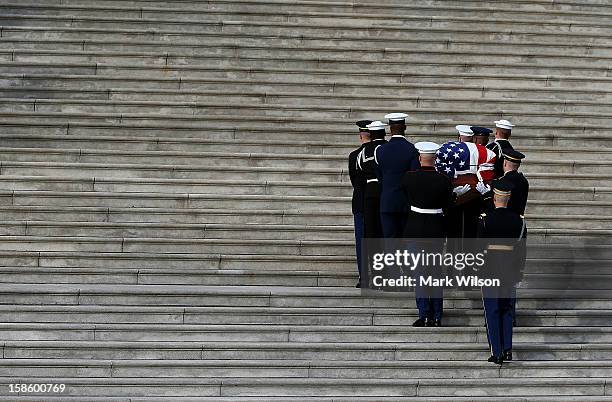 The late Senator Daniel Inouye is carried in a casket up the steps of the U.S. Capitol December 20, 2012 in Washington, DC. Senator Inouye, who was...