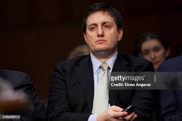 Philippe Reines, Senior Advisor to Secretary of State Hillary Clinton, listens to testmony while sitting in the audience during the Senate Foreign...