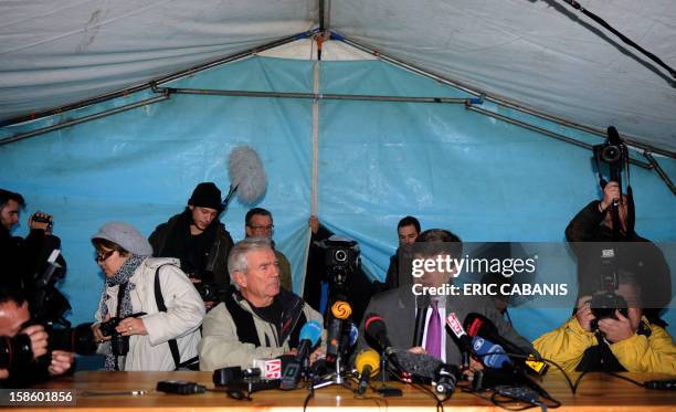 Jean-Pierre Delord , the mayor of Bugarach, and Eric Freysselinard, the prefect of the Aude department of France, give a press conference on December...