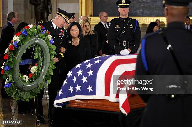 Irene Hirano Inouye, wife of the late Senator Daniel Inouye , takes a last look at the flag draped casket at the Rotunda of the U.S. Capitol during a...