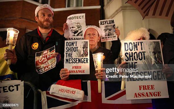 Supporters of Wikileaks founder Julian Assange wait for him to speak at the Ecuadorian Embassy on December 20, 2012 in London, England. Mr Assange...