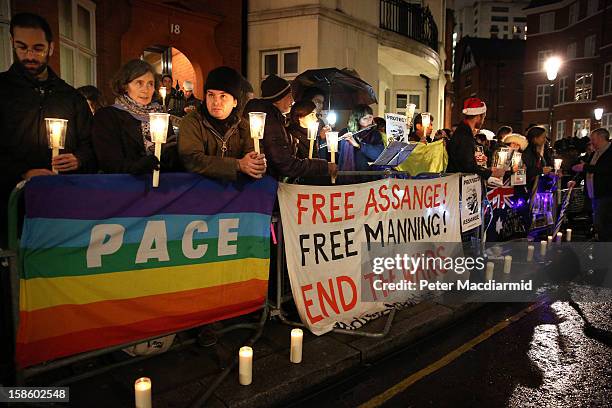 Supporters of Wikileaks founder Julian Assange wait for him to speak at the Ecuadorian Embassy on December 20, 2012 in London, England. Mr Assange...