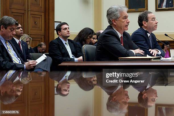 Deputy Secretary of State William Burns and Deputy Secretary of State for Management and Resources Thomas Nides testify during the House Foreign...