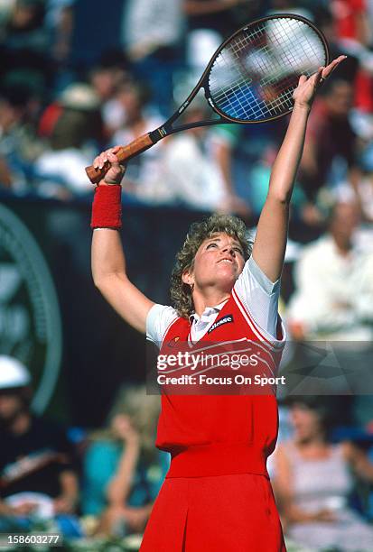 Chris Evert-Lloyd serves the ball during the Women's 1984 US Open Tennis Championships circa 1984 at the USTA Tennis Center in the Queens borough of...