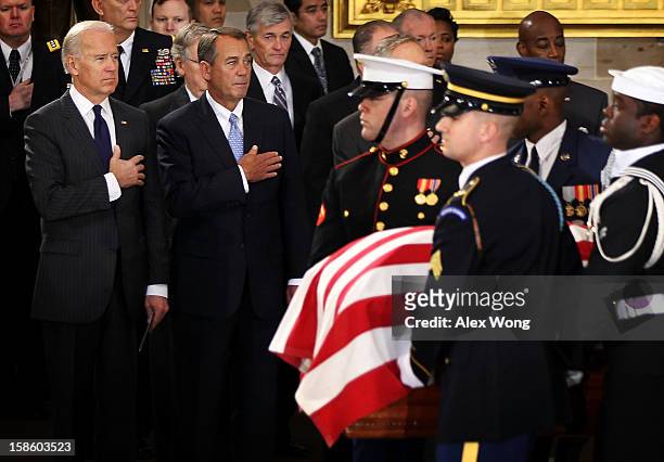 Vice President Joseph Biden and Speaker of the House Rep. John Boehner put their hands atop their hearts as the flag draped casket of Senator Daniel...