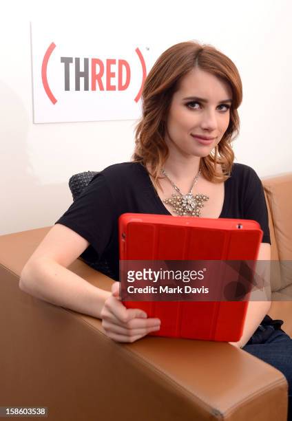 Actress Emma Roberts plays , a mobile game from The Coca-Cola Company and to help deliver an AIDS FREE GENERATION on December 20, 2012 in Los...