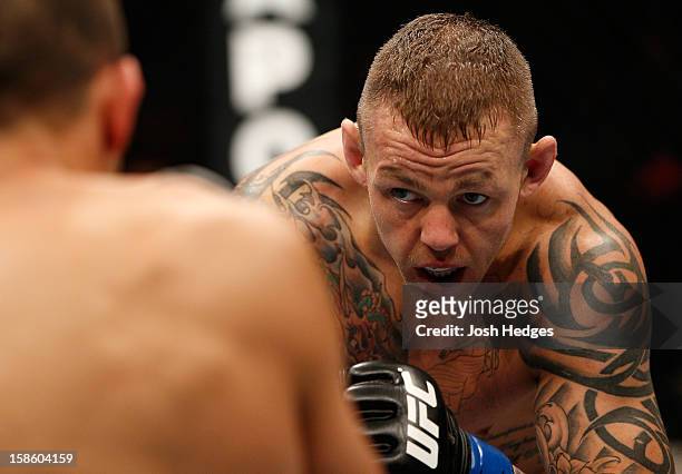 Ross Pearson squares off with George Sotiropoulos during their lightweight fight at the UFC on FX event on December 15, 2012 at Gold Coast Convention...