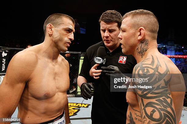 Opponents George Sotiropoulos and Ross Pearson face off before their lightweight fight at the UFC on FX event on December 15, 2012 at Gold Coast...