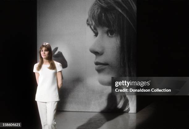 French singer and actress Francoise Hardy performs on the NBC TV music show 'Hullabaloo' in April 1965 in New York City, New York.