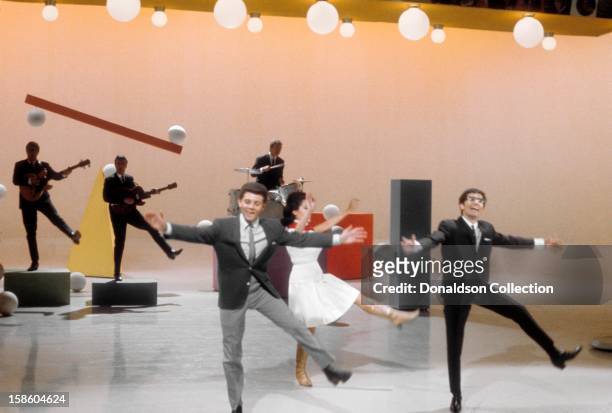 Actress and singer Annette Funicello perform with Frankie Avalon and Freddie Garrity and Freddie and The Dreamers on the NBC TV music show...